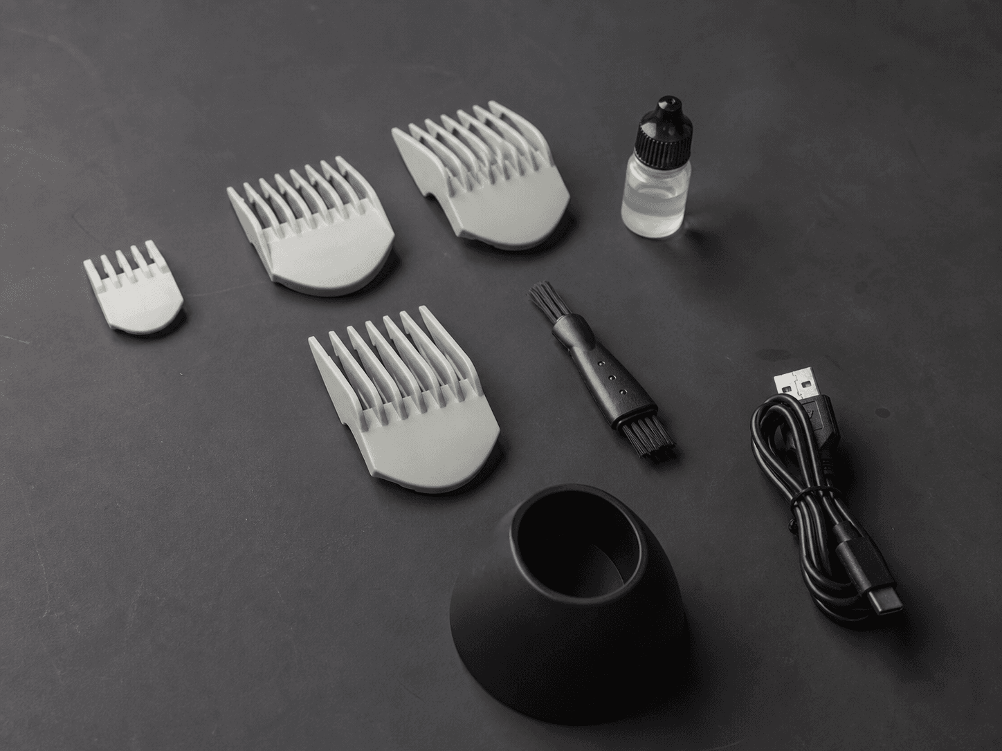 OEM grooming accessories arranged on a product sampling workbench