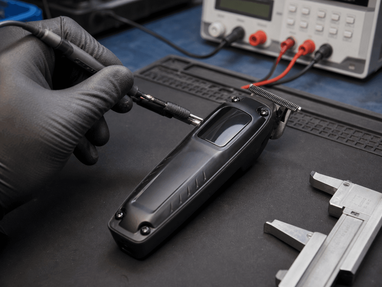 Grooming trimmer undergoing a practical engineering performance check